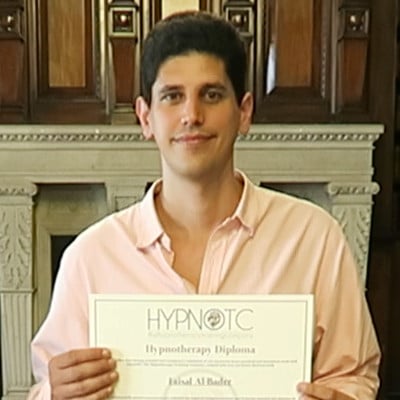 Hypnotherapy graduate, holding the hypnotherapy diploma certificate.