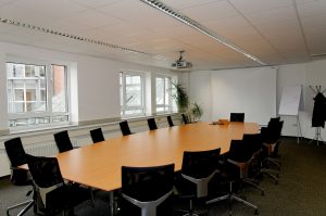 Meeting room with table and chairs - best hypnotherapy course blog 
