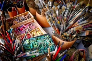 What is hypnotherapy used for? Enhance creativity. A picture of artist supplies.